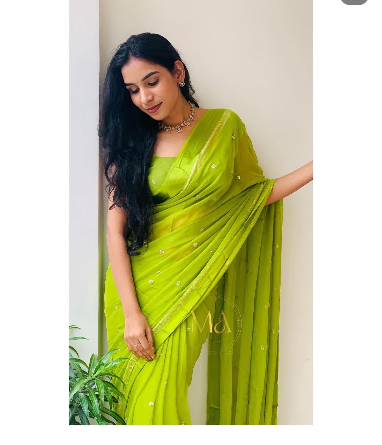 Light Green Viscose Georgette Sequins Saree with Satin Border & Contrast Blouse – Partywear Collection