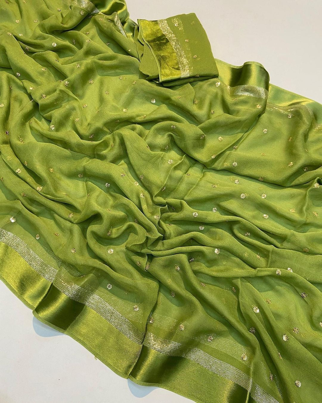 Light Green Viscose Georgette Sequins Saree with Satin Border & Contrast Blouse – Partywear Collection